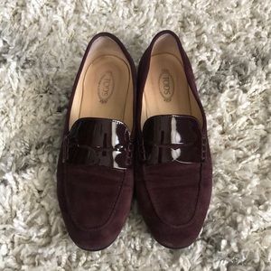 Tod’s 37.5 purple penny loafer flat.